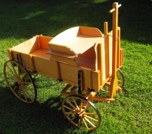 Hand-made wagon (goat cart) is hard to let go
